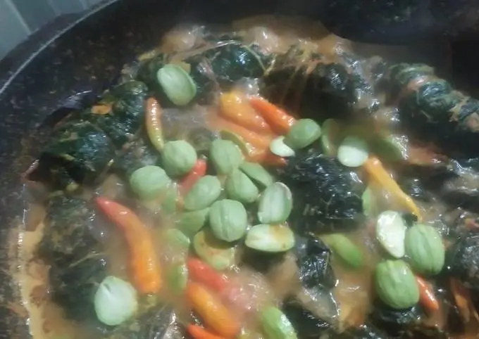 Proses memasak buntil daun pepaya